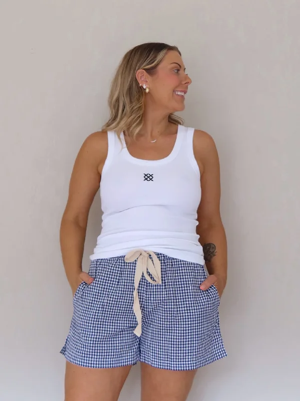 Cargo shorts – Loose-fitting shorts with large side pockets, often made from durable material for a utilitarian look.Kingsley Gingham Shorts - Navy