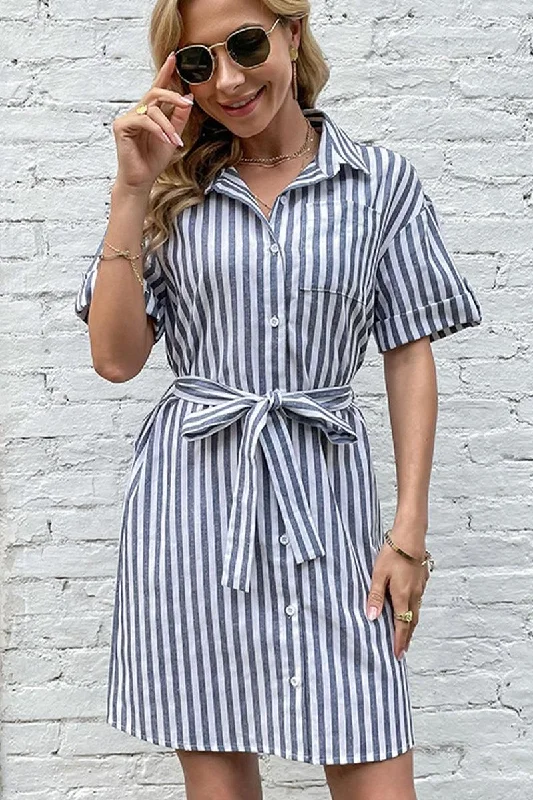 Tulle dress – Dress made with soft, voluminous tulle fabric, often worn for formal occasions or as part of a bridal outfit.WOMEN BUTTON UP STRIPE SLIT DRESS