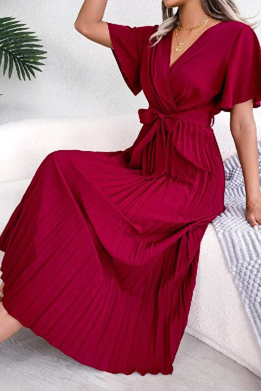 Wrap dress – Dress that wraps around the body and ties at the waist, creating a flattering and adjustable fit.WOMEN CAPE SLEEVE TIED WAIST PLEATED LONG DRESS