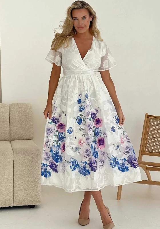 Ball gown dress – Formal, full-skirted dress often worn for weddings, proms, or galas.Girl in Mind Lucy Floral Wrap Dress, White