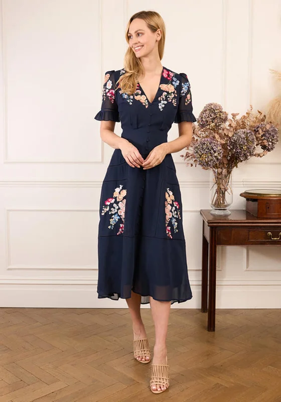 Peplum dress – Dress with a flared ruffle or extra fabric at the waist, adding volume and shaping to the lower half.Hope & Ivy Clarice Embroidered Button Front Midi Dress, Navy