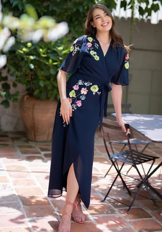 Tea-length dress – Dress that falls between the knee and ankle, perfect for more formal or vintage-inspired occasions.Hope & Ivy Farrah 3D Embellished Flutter Sleeve Maxi Wrap Dress, Navy