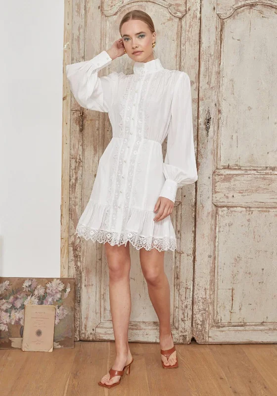 Pleated skirt – Skirt with folds or pleats, adding volume and texture to the fabric.Jovonna Leone Lace Mini Shirt Dress, White