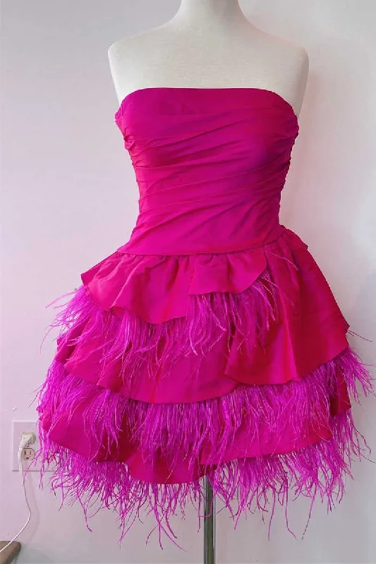 Lace dress – Dress made with lace fabric, often delicate and romantic, suitable for special occasions.Strapless Fuchsia Tiered A-Line Homecoming Dress with Feathers