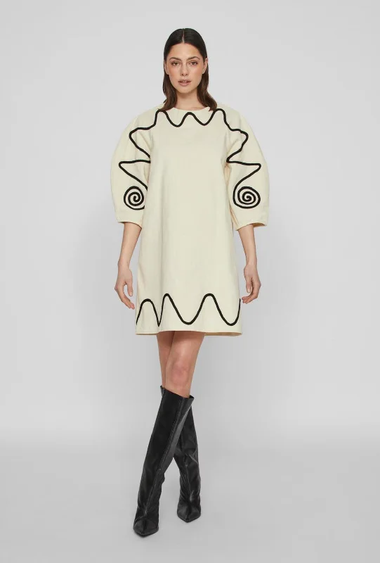 Skater skirt – Flared skirt that is fitted at the waist and flares out, resembling the shape of a skating skirt.Vila Sada Embroidered Cotton Mini Dress, Cloud Dancer