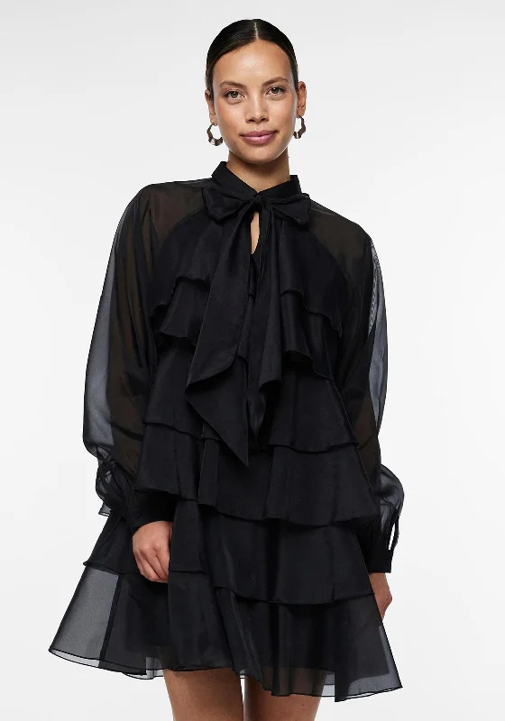 Skater skirt – Flared skirt that is fitted at the waist and flares out, resembling the shape of a skating skirt.Y.A.S Eloise Bow Tie Neckline Tiered Mini Dress, Black