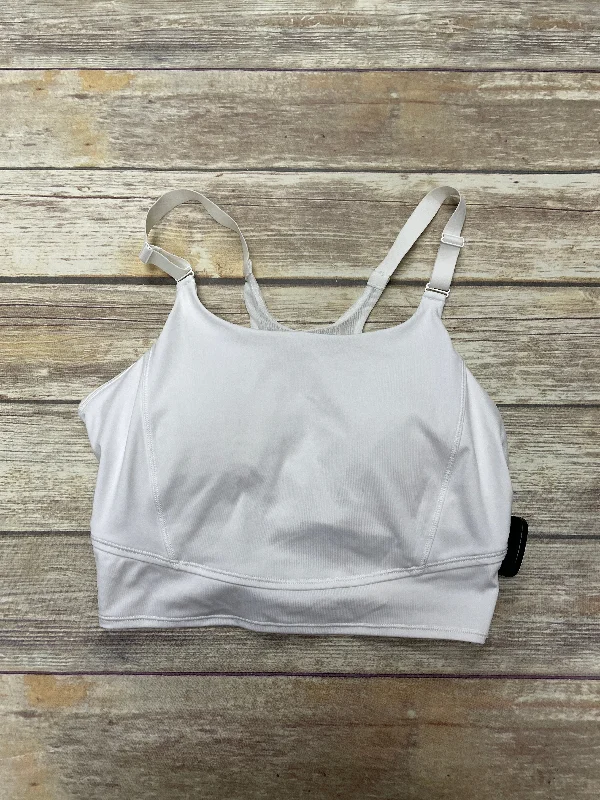 Maternity sports bra – Sports bra designed for pregnant women, offering extra support and flexibility for changing bodies.Athletic Bra By All In Motion In White, Size: L