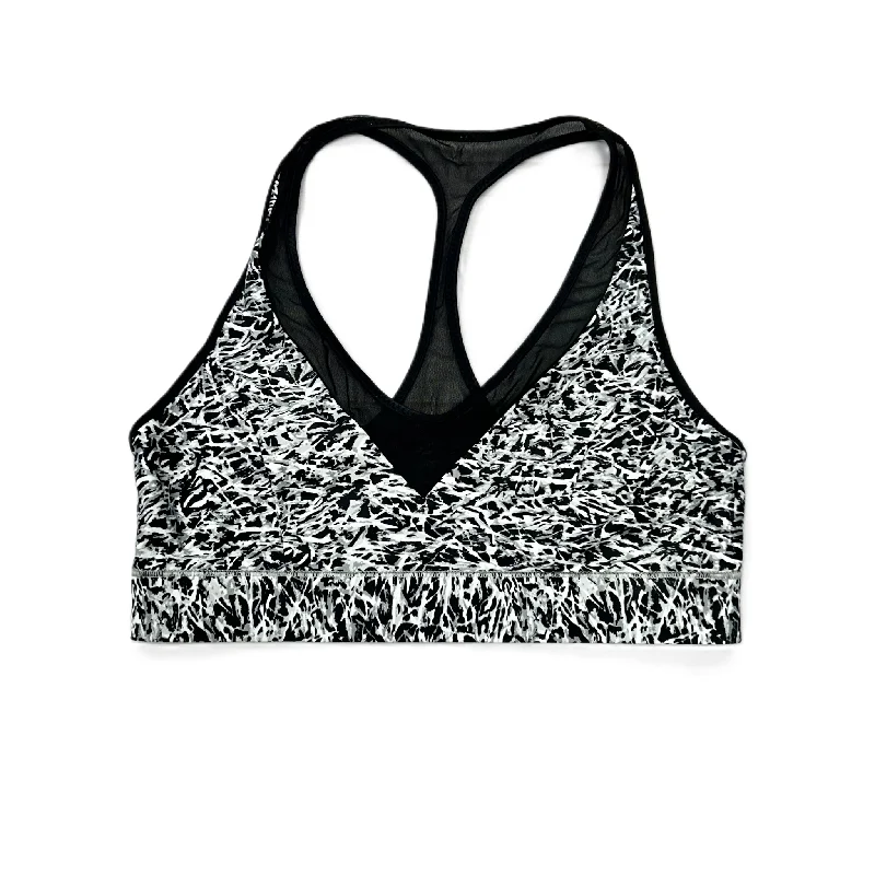 Criss-cross strap sports bra – Sports bra with straps that cross over at the back, providing extra support and a stylish look.Athletic Bra By Lululemon In Black & White, Size: Xs