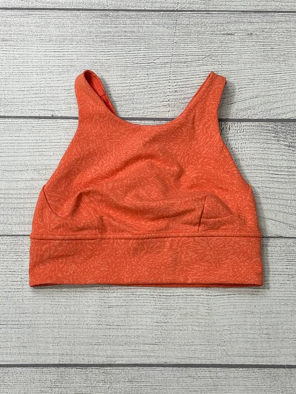 Push-up sports bra – Sports bra with added padding or structure to lift and shape the bust, providing extra support.Athletic Bra By Lululemon In Orange, Size: 6