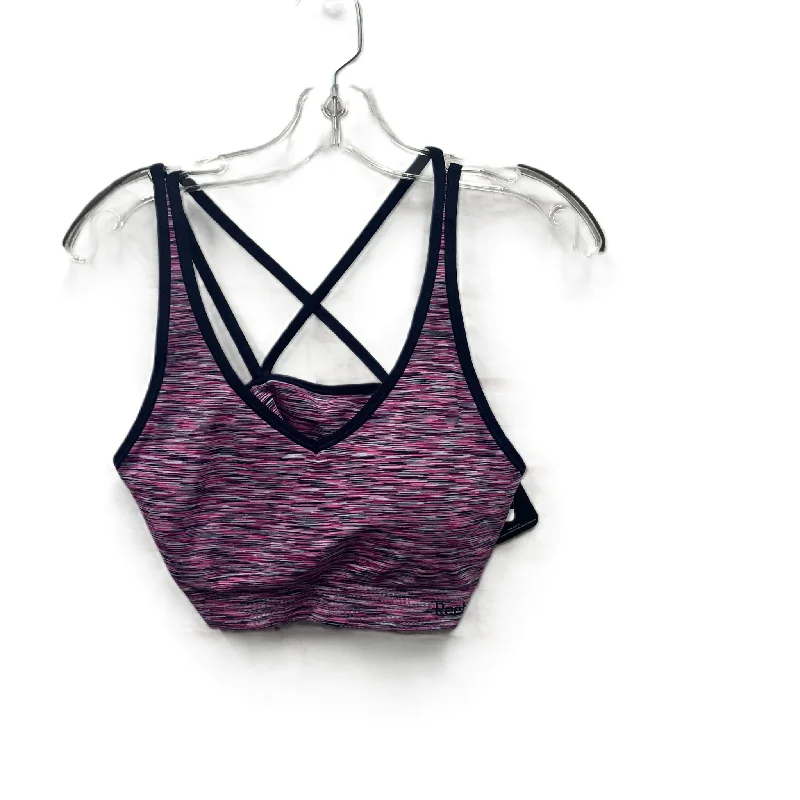 Compression sports bra – Sports bra that compresses the chest for a more secure fit and reduced bounce during high-impact activities.Athletic Bra By Reebok In Purple, Size: Xl