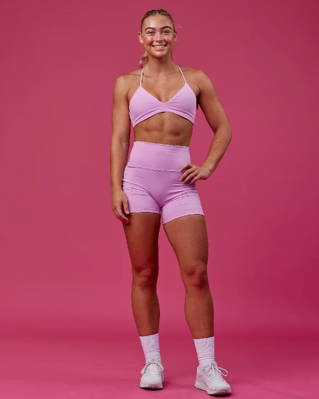 Front-closure sports bra – Sports bra that fastens at the front, often with hooks, zippers, or snaps, for easier wear.Aura Sports Bra - Pastel Orchid