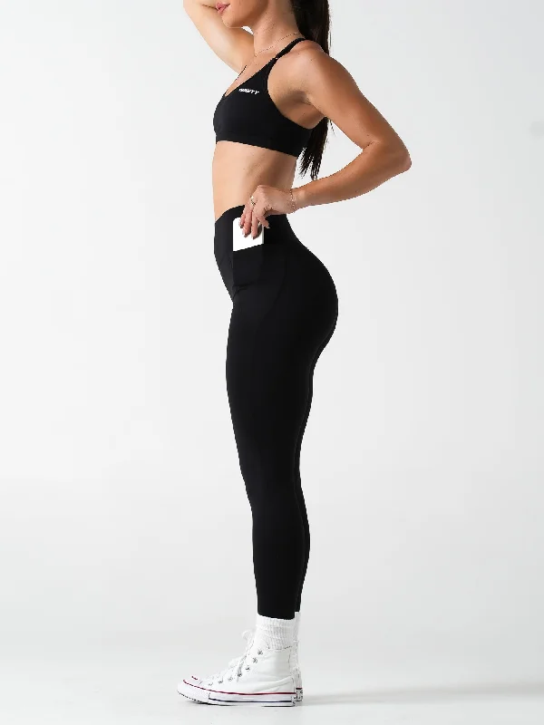 Compression sports bra – Sports bra that compresses the chest for a more secure fit and reduced bounce during high-impact activities.Base Pocket Scrunch Leggings | Full Length