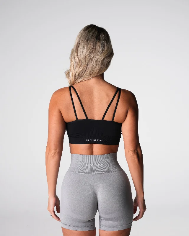 Mesh sports bra – Sports bra with mesh panels or details, promoting airflow and breathability during intense workouts.Black Bliss Seamless Bra