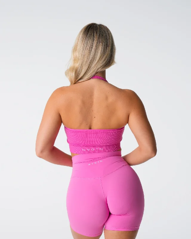 Padded sports bra – Sports bra with soft, removable padding for extra comfort and shape.Bubble Gum Pink Limitless Ribbed Seamless Halter Bra