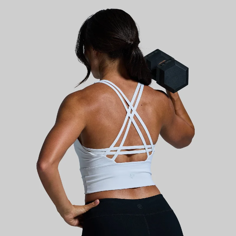 Compression sports bra – Sports bra that compresses the chest for a more secure fit and reduced bounce during high-impact activities.Crossfire Sports Bra (White)