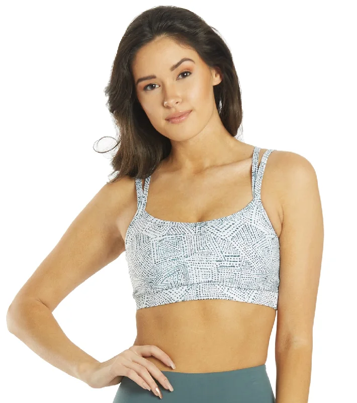 Mesh sports bra – Sports bra with mesh panels or details, promoting airflow and breathability during intense workouts.Everyday Yoga Wholesome Tribe Sports Bra White Tribal