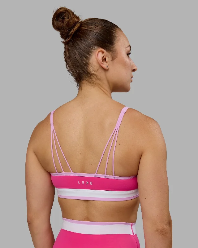 Compression tank sports bra – Combination of a tank top and sports bra, providing full coverage and support for the upper body.Excel Sports Bra - Ultra Pink