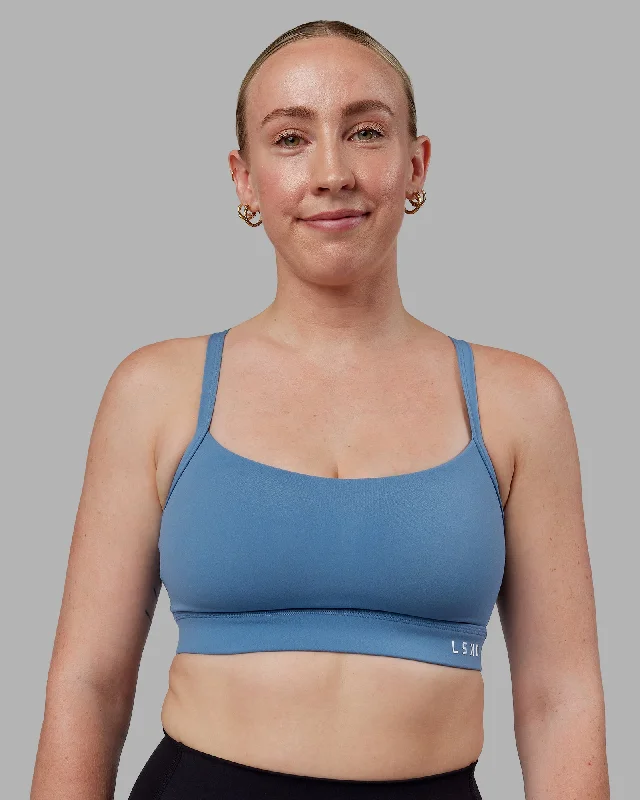 Criss-cross strap sports bra – Sports bra with straps that cross over at the back, providing extra support and a stylish look.Momentum Sports Bra (D/DD/E) - Elemental Blue