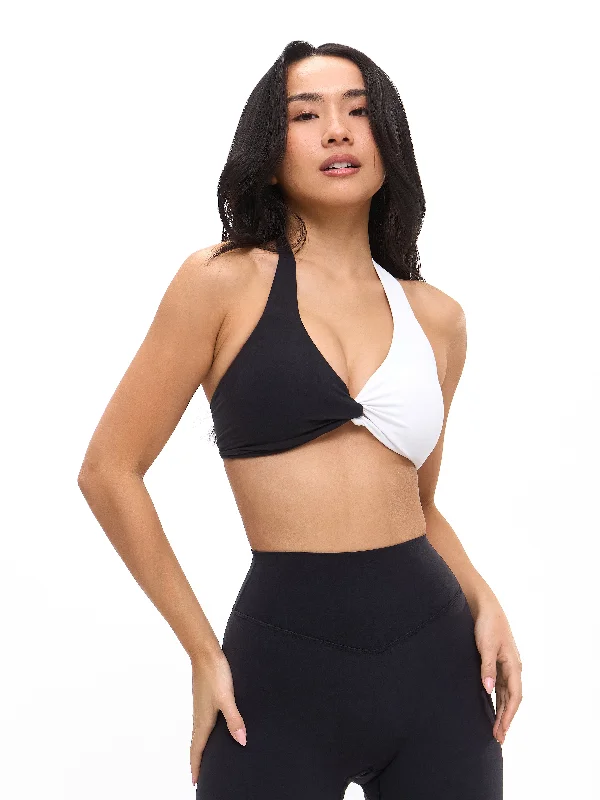 Padded sports bra – Sports bra with soft, removable padding for extra comfort and shape.Poshknit Twist Halter Sports Bra - Black / White