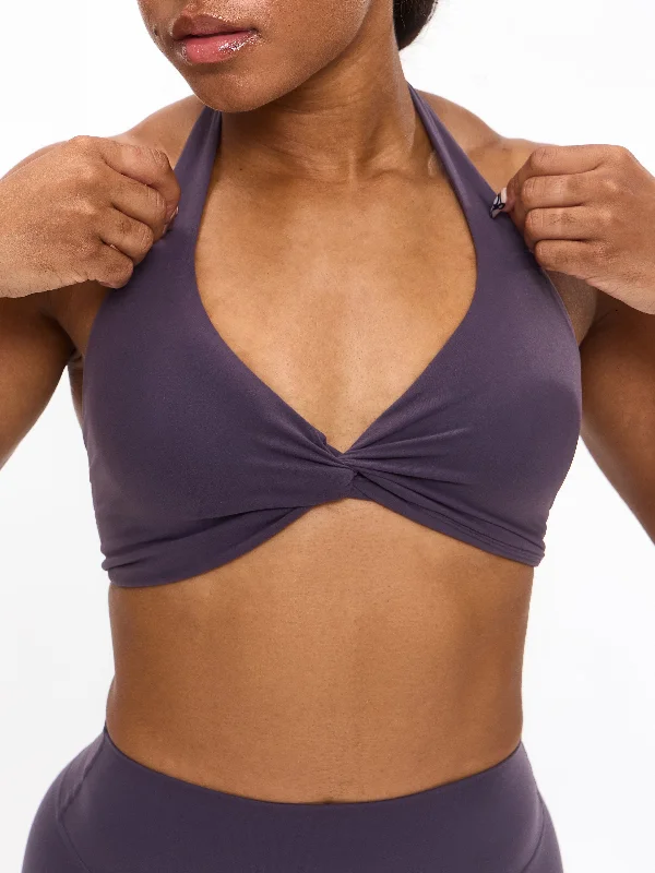 Medium-impact sports bra – Suitable for moderate-intensity activities like cycling or strength training, offering balanced support.Poshknit Twist Halter Sports Bra - Purple Shadow