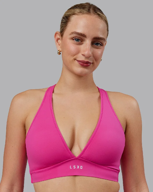 Medium-impact sports bra – Suitable for moderate-intensity activities like cycling or strength training, offering balanced support.Stamina Sports Bra (D/DD/E) - Fuchsia Pink