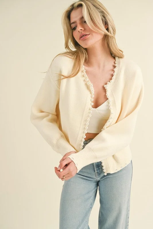 Waffle knit – Textured knit resembling a waffle patternCarrie Pearl Sweater