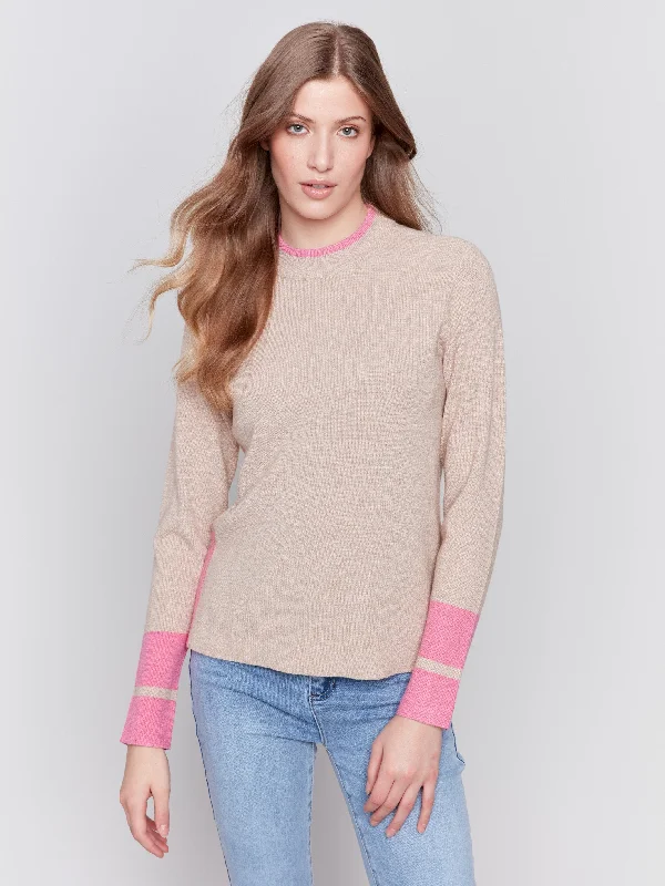 Raglan sleeve – Diagonal sleeve seams that extend to the necklineCrew Neck Sweater with Side Slit - Truffle