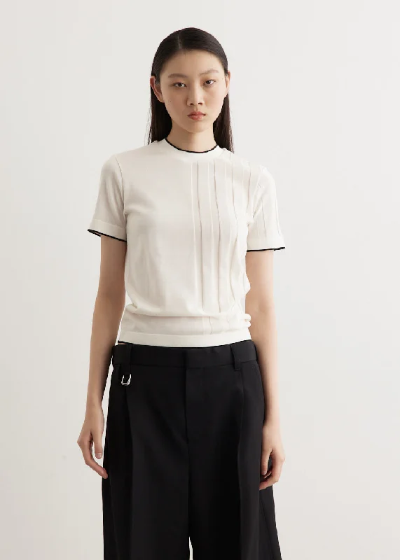 Banded hem – T-shirt with a stitched or elastic band at the bottomLe T-Shirt Tricot