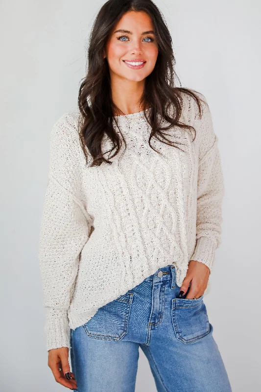 These keywords help define the specific style or feel of a sweater, allowing for more targeted searches or descriptions. Are you looking for a particular sweater style or just exploring different options?Modern Comfort Natural Cable Knit Sweater