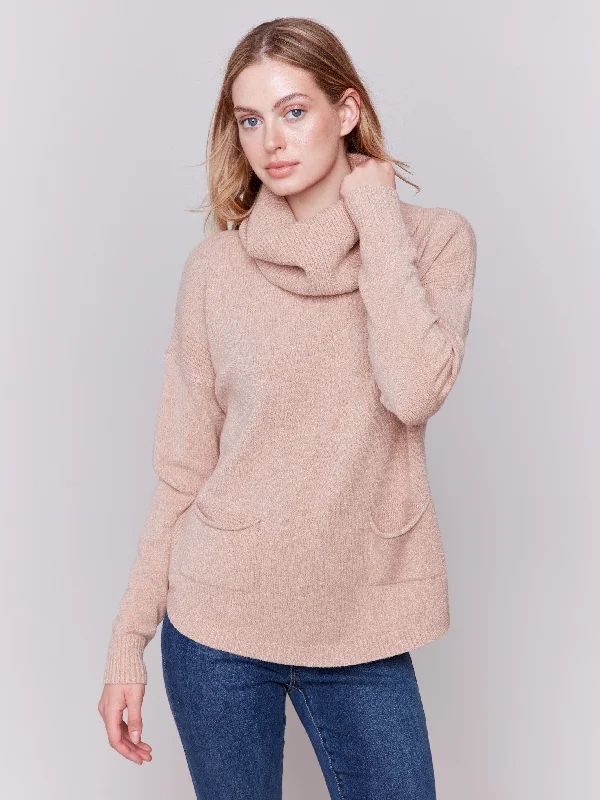 These keywords help define the specific style or feel of a sweater, allowing for more targeted searches or descriptions. Are you looking for a particular sweater style or just exploring different options?Sweater with Removable Scarf - Truffle