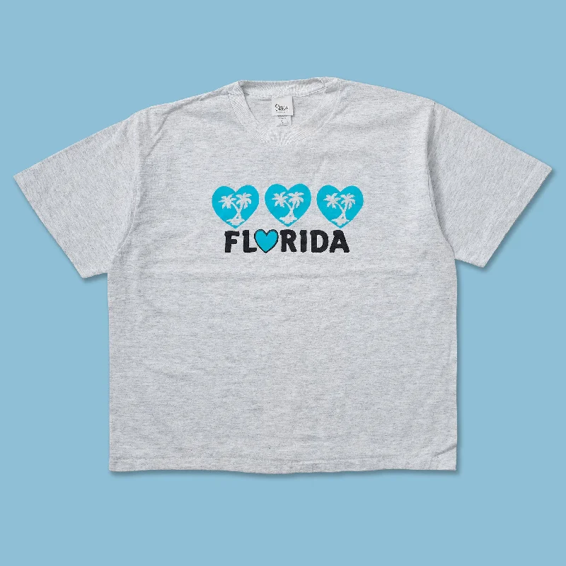 Raglan sleeve – Diagonal seam extending from the underarm to neckline, giving a sporty lookVintage Florida T-Shirt Small