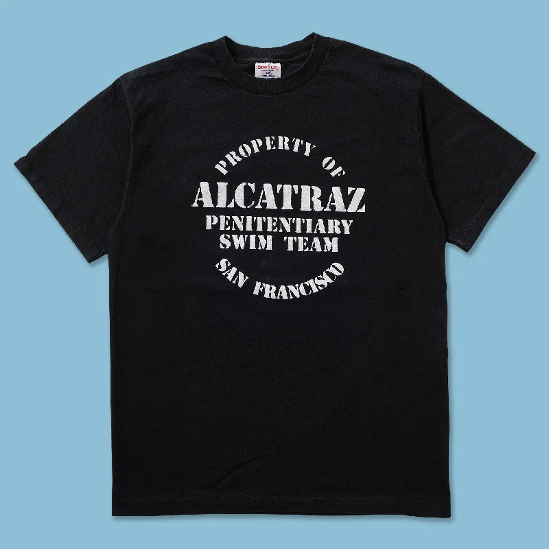 Tunic – Longer T-shirt, often reaching the hips or thighs, worn as a tunic topVintage Property Of Alcatraz T-Shirt Large