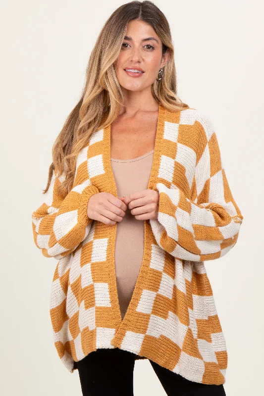 These keywords help define the specific style or feel of a sweater, allowing for more targeted searches or descriptions. Are you looking for a particular sweater style or just exploring different options?Yellow Checkered Oversized Maternity Cardigan